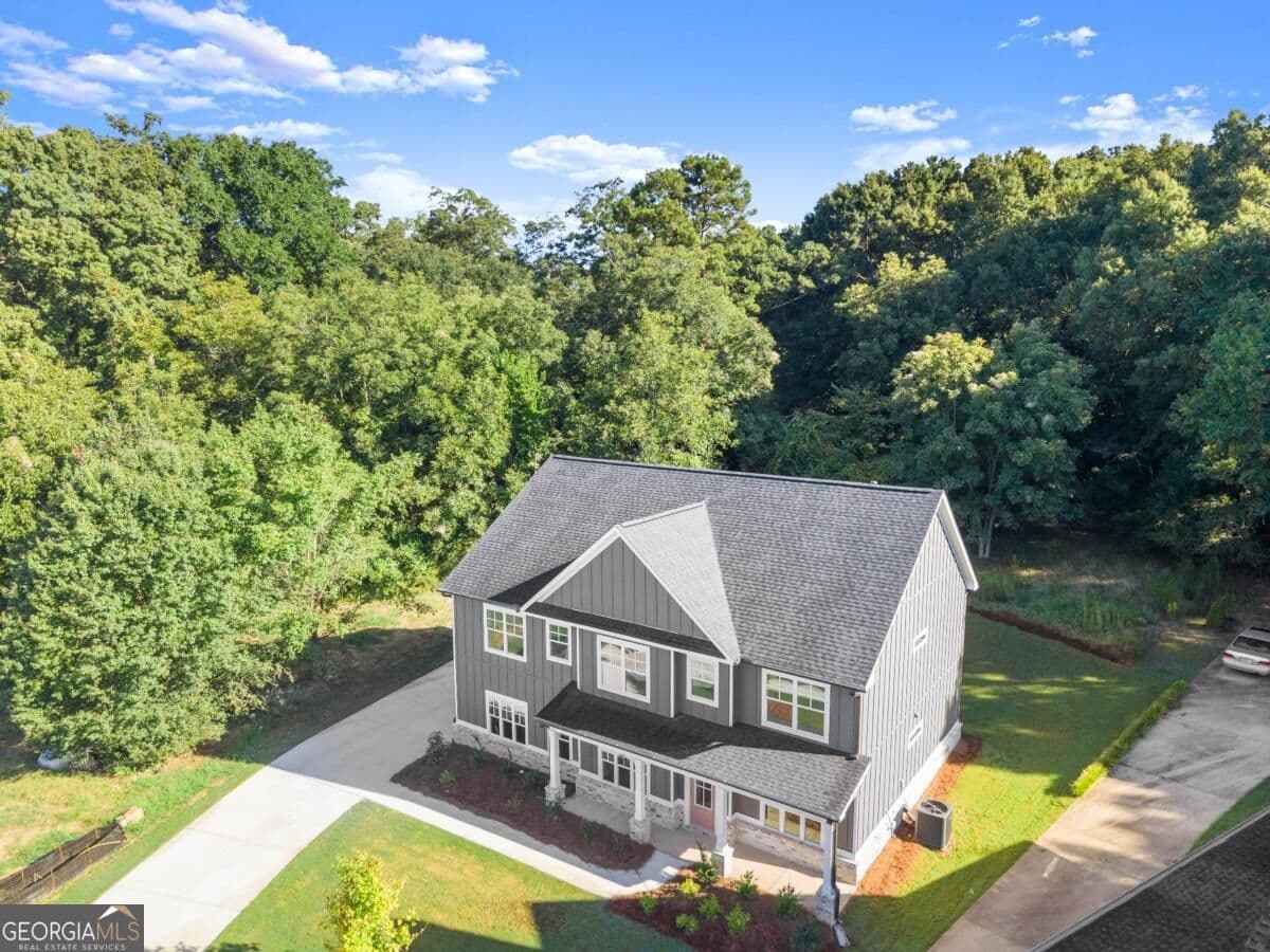 5 bedroom, 3 bathroom, 2,983 sq ft single family residence for sale at 4306 Brookhaven Drive, Covington, GA 30014 — photo 2
