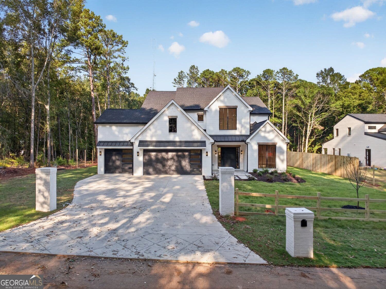 4 bedroom, 3.5 bathroom, 4,265 sq ft single family residence for sale at 596 Hoke O'Kelly Mill Road, Loganville, GA 30052 — photo 2