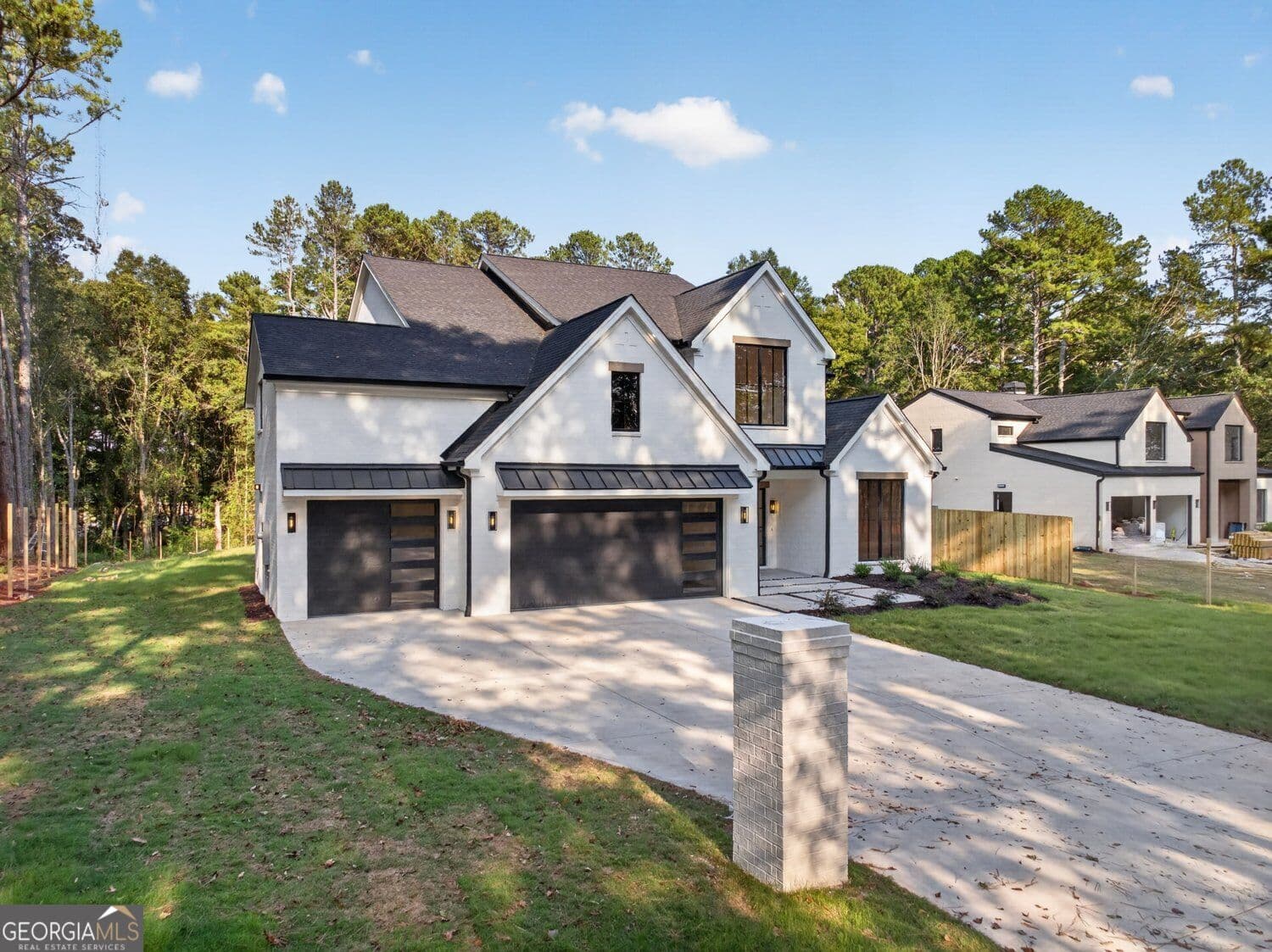 4 bedroom, 3.5 bathroom, 4,265 sq ft single family residence for sale at 596 Hoke O'Kelly Mill Road, Loganville, GA 30052 — photo 3