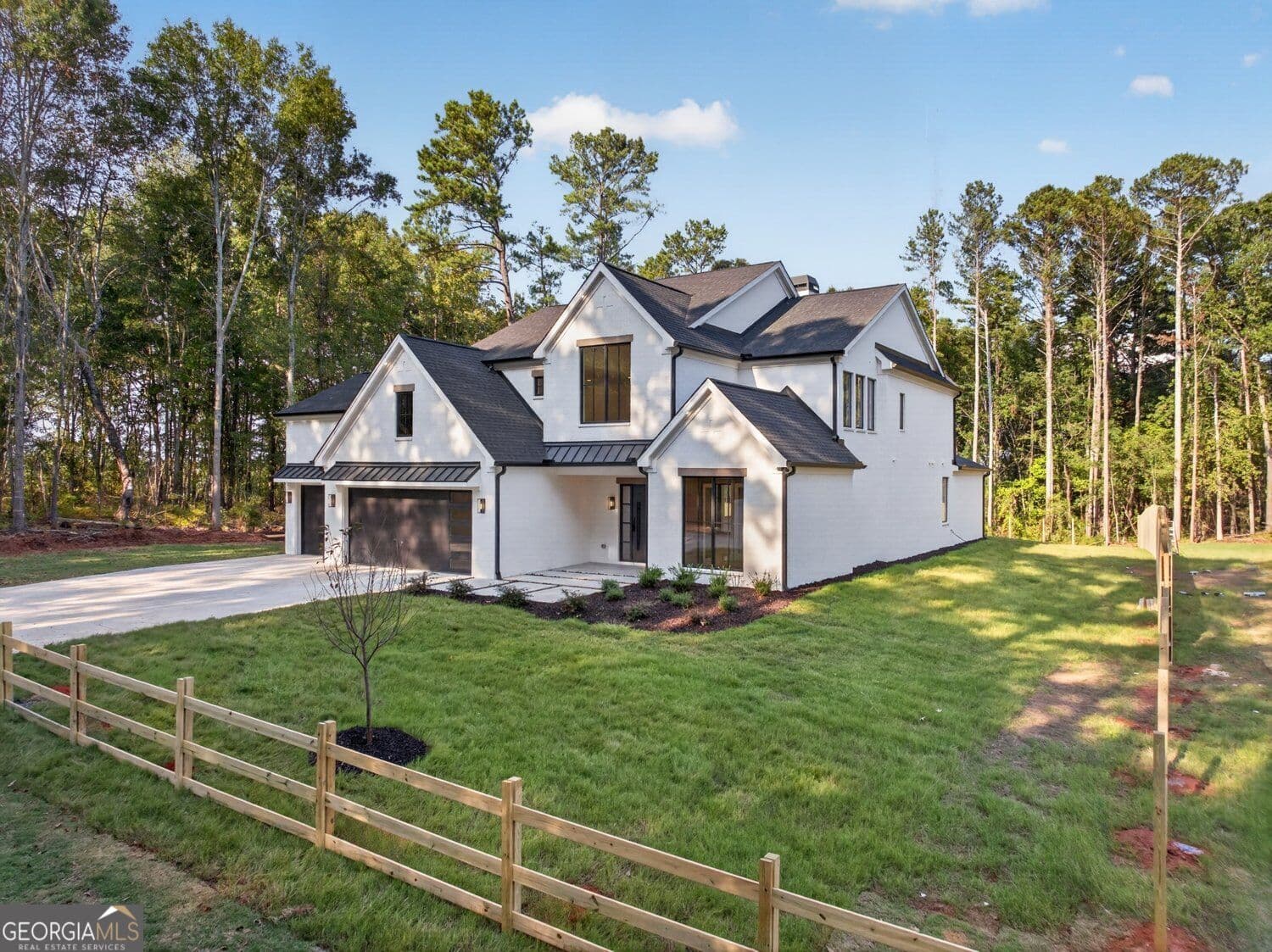 4 bedroom, 3.5 bathroom, 4,265 sq ft single family residence for sale at 596 Hoke O'Kelly Mill Road, Loganville, GA 30052 — photo 4