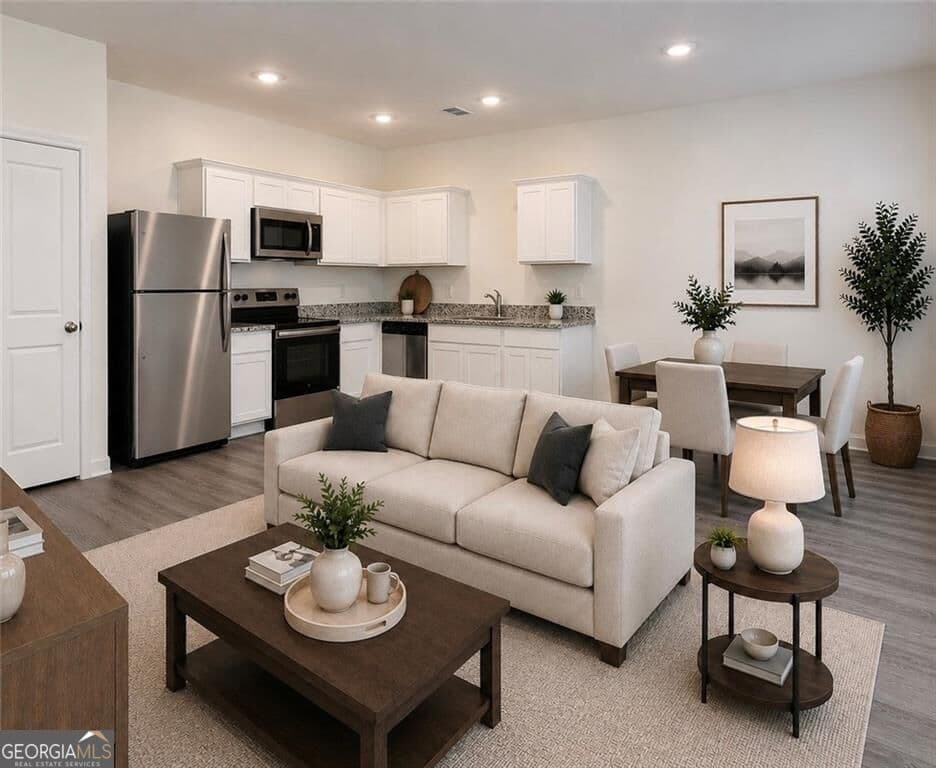 3 bedroom, 2.5 bathroom, 1,421 sq ft townhouse for sale at 1147 Lucienne Boulevard, Auburn, GA 30011 — photo 3
