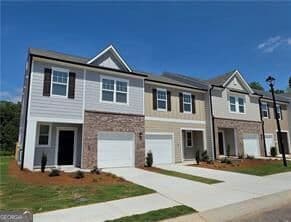 3 bedroom, 2.5 bathroom, 1,421 sq ft townhouse for sale at 1147 Lucienne Boulevard, Auburn, GA 30011 — photo 1 of 37