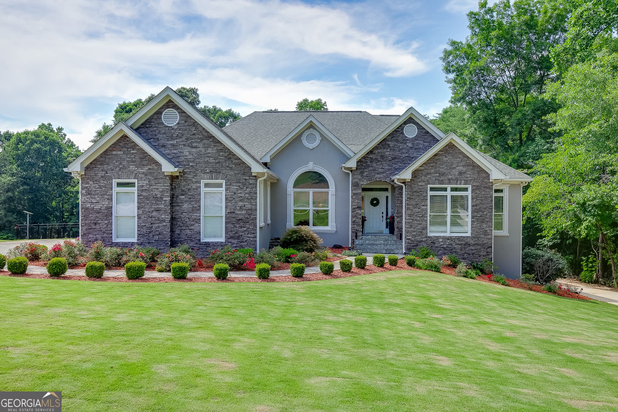 6 bedroom, 5 bathroom, 5,220 sq ft single family residence sold at 765 River Chase, Hoschton, GA 30548