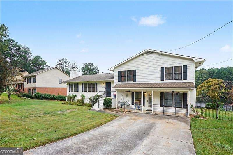 4 bedroom, 3.5 bathroom single family residence for sale at 4238 Rocky Ledge Way, Snellville, GA 30039 — photo 2