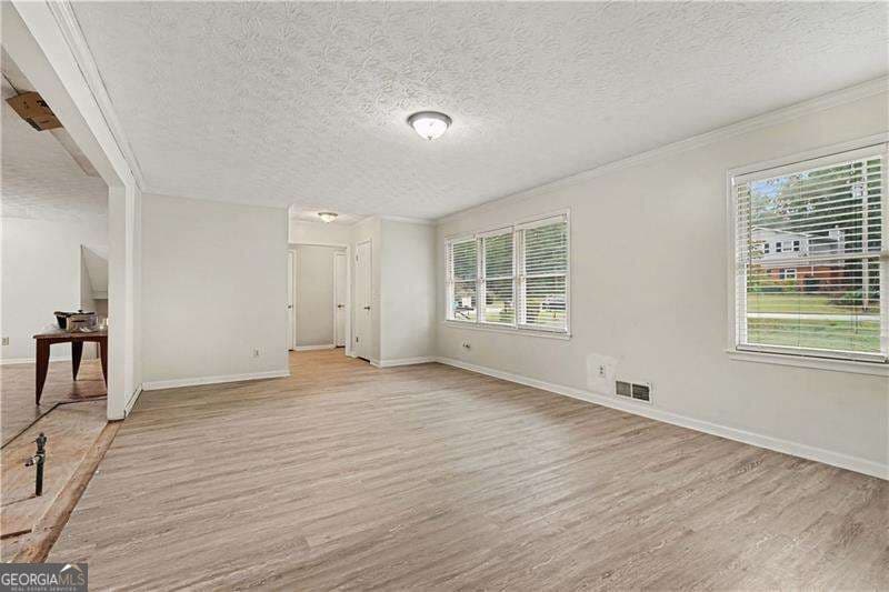 4 bedroom, 3.5 bathroom single family residence for sale at 4238 Rocky Ledge Way, Snellville, GA 30039 — photo 5