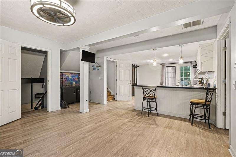 4 bedroom, 3.5 bathroom single family residence for sale at 4238 Rocky Ledge Way, Snellville, GA 30039 — photo 9