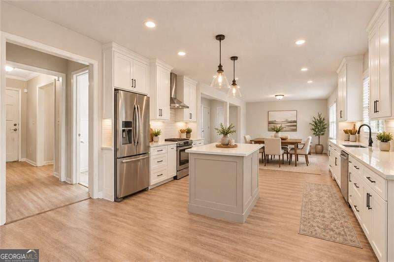 4 bedroom, 3.5 bathroom single family residence for sale at 4238 Rocky Ledge Way, Snellville, GA 30039 — photo 8
