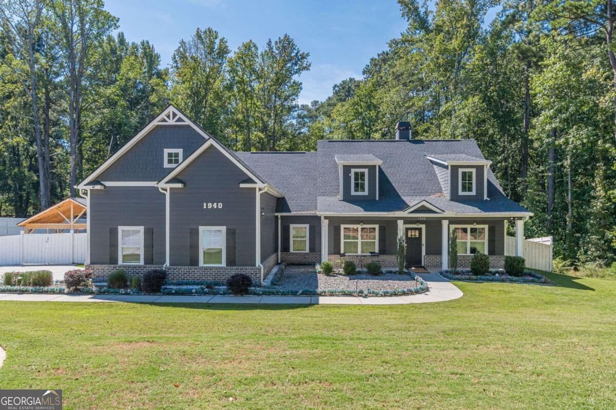 4 bedroom, 3 bathroom, 2,272 sq ft single family residence for rent at 1940 Old Jackson Road, Locust Grove, GA 30248 for $3,595 a month — photo 1 of 57