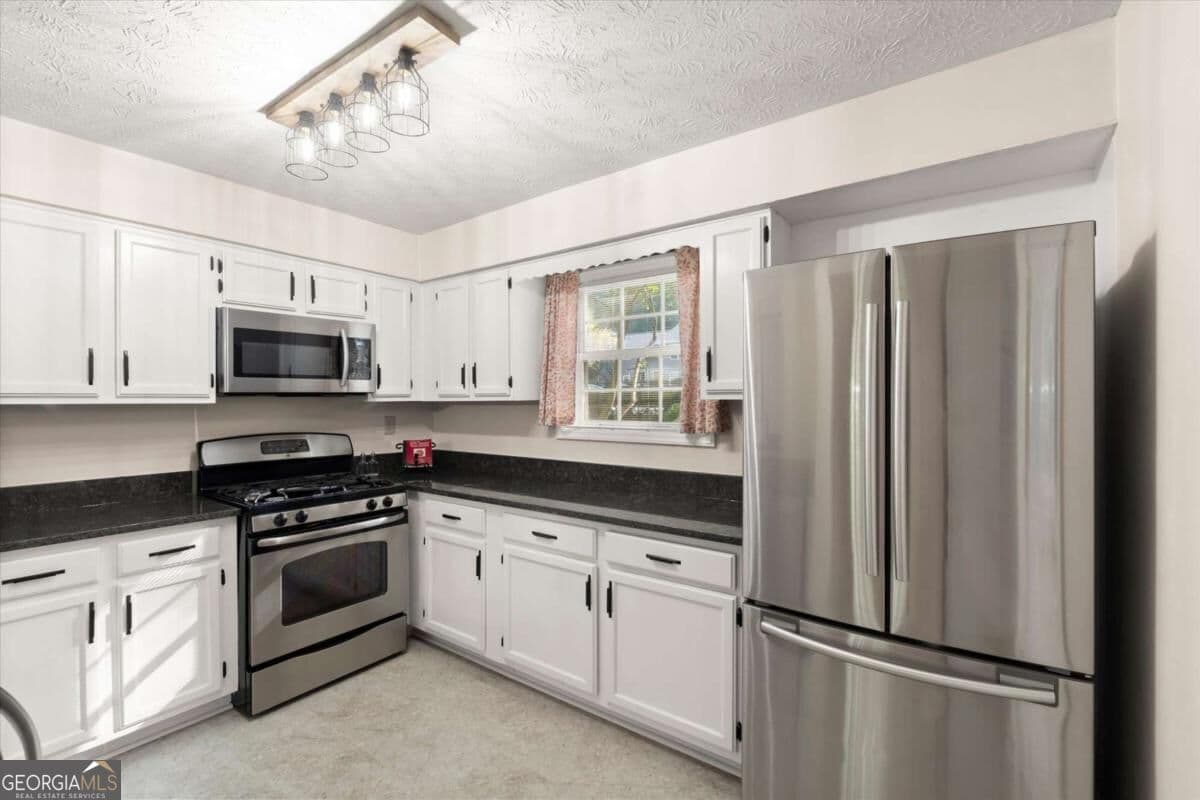 2 bedroom, 2 bathroom, 1,258 sq ft condominium for sale at 1500 Oakridge Court, Decatur, GA 30033 — photo 7