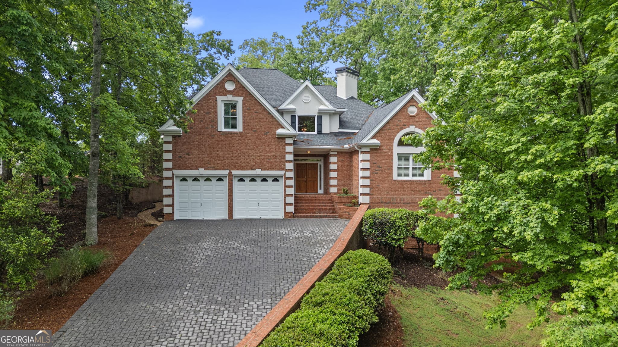 4 bedroom, 3.5 bathroom single family residence sold at 7830 Kings Point Drive, Cumming, GA 30041