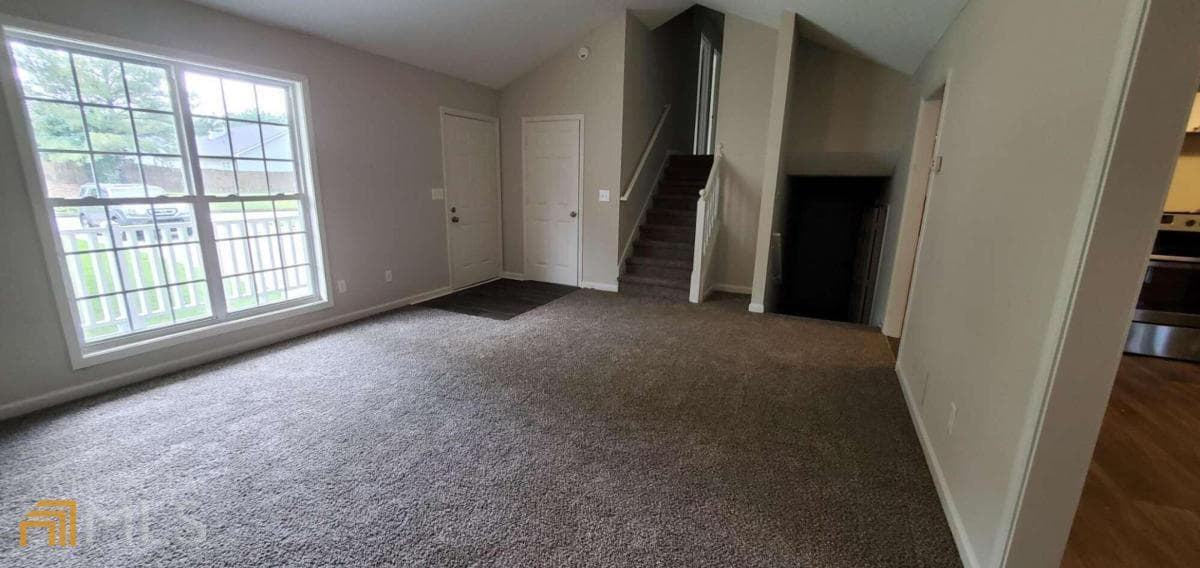 4 bedroom, 3 bathroom, 1,806 sq ft single family residence for sale at 6050 April Drive, Sugar Hill, GA 30518 — photo 7