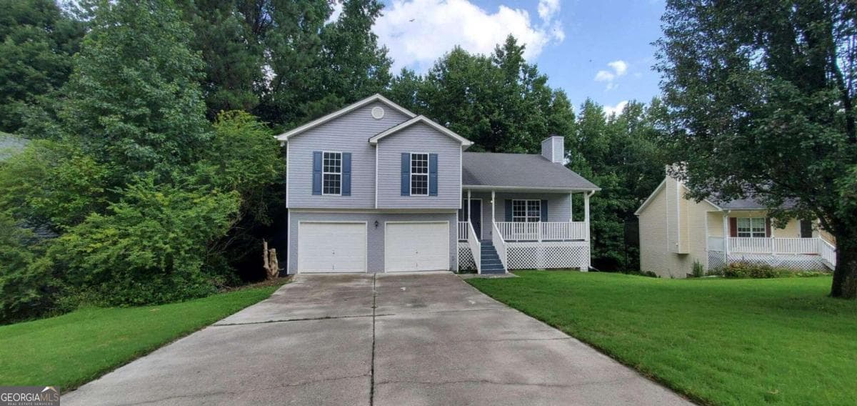 4 bedroom, 3 bathroom, 1,806 sq ft single family residence for sale at 6050 April Drive, Sugar Hill, GA 30518