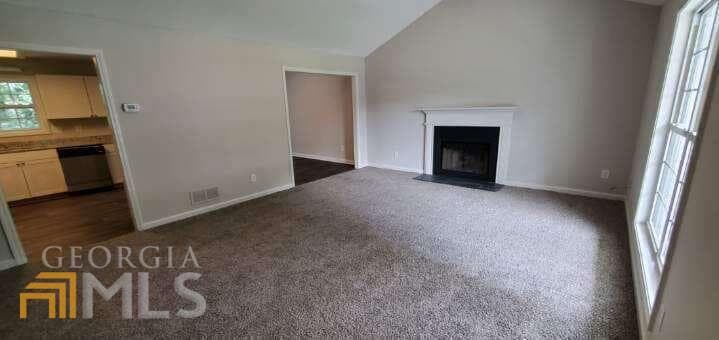 4 bedroom, 3 bathroom, 1,806 sq ft single family residence for sale at 6050 April Drive, Sugar Hill, GA 30518 — photo 5