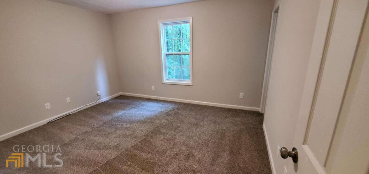 4 bedroom, 3 bathroom, 1,806 sq ft single family residence for sale at 6050 April Drive, Sugar Hill, GA 30518 — photo 9