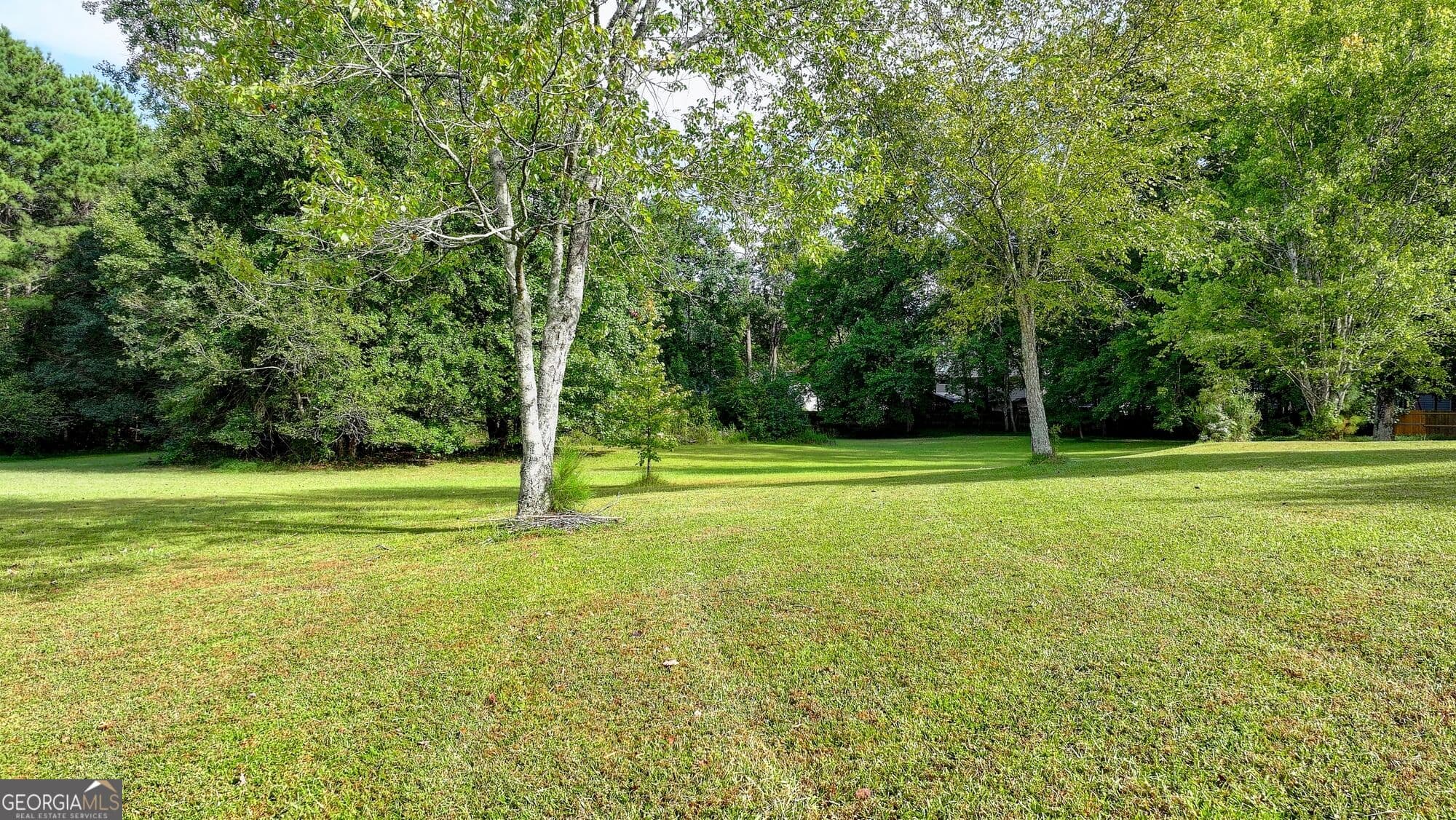 3 bedroom, 3 bathroom, 1,582 sq ft single family residence for sale at 5680 Abbotts Bridge Road, Johns Creek, GA 30097 — photo 6