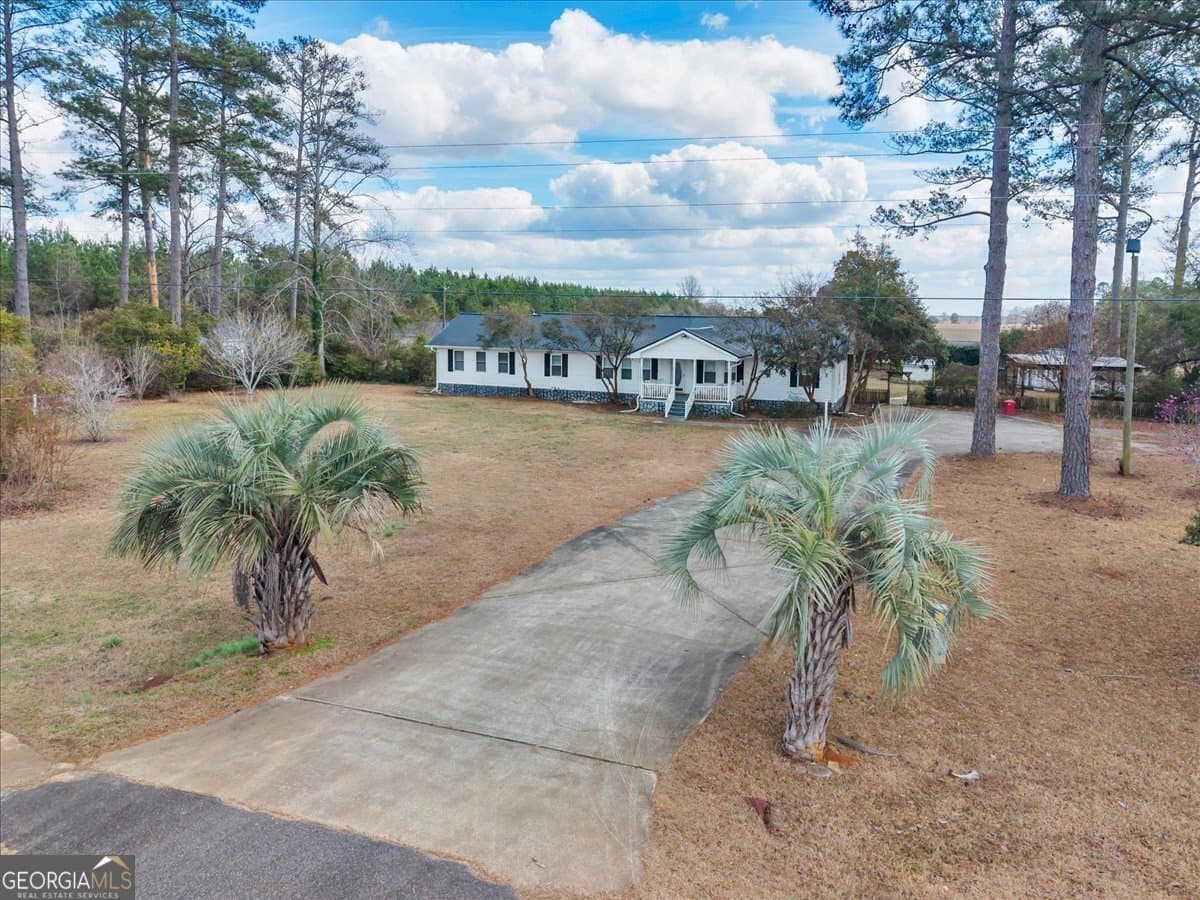 3 bedroom, 3 bathroom, 2,672 sq ft manufactured home,single family residence for sale at 10780 Highway 112, Irwinton, GA 31042 — photo 4