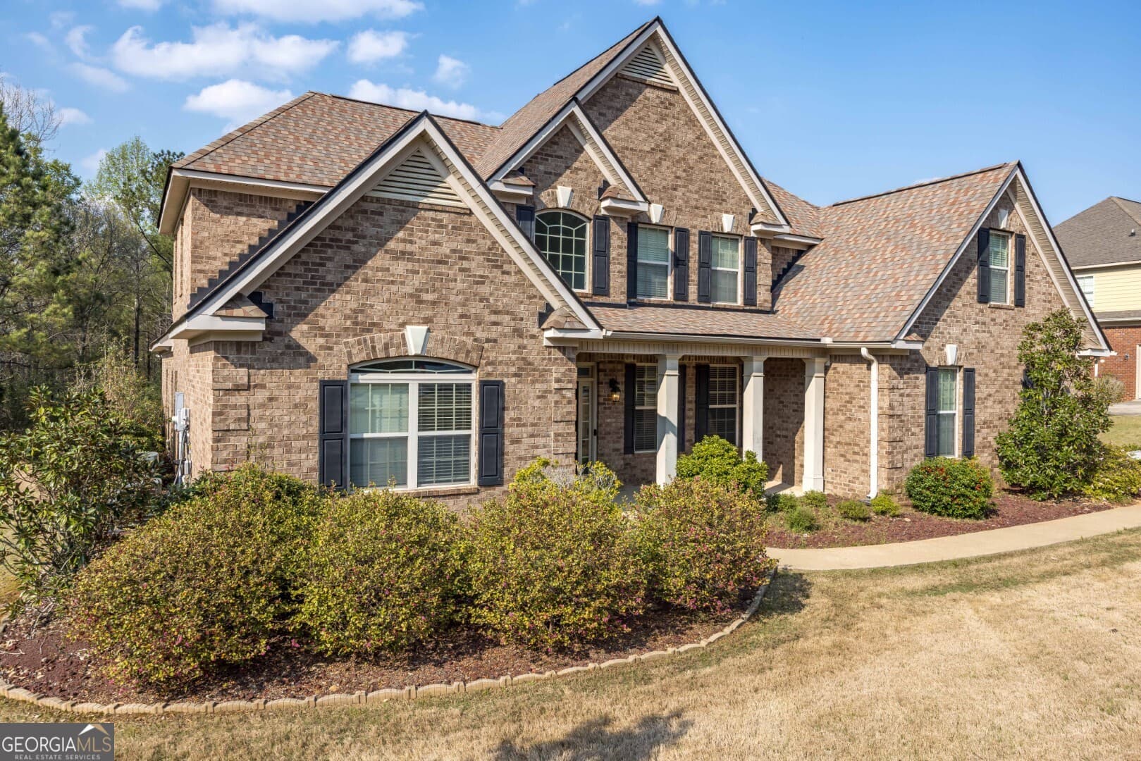 5 bedroom, 3.5 bathroom, 3,639 sq ft single family residence for sale at 7014 Bridgemill Drive, Columbus, GA 31904 — photo 2