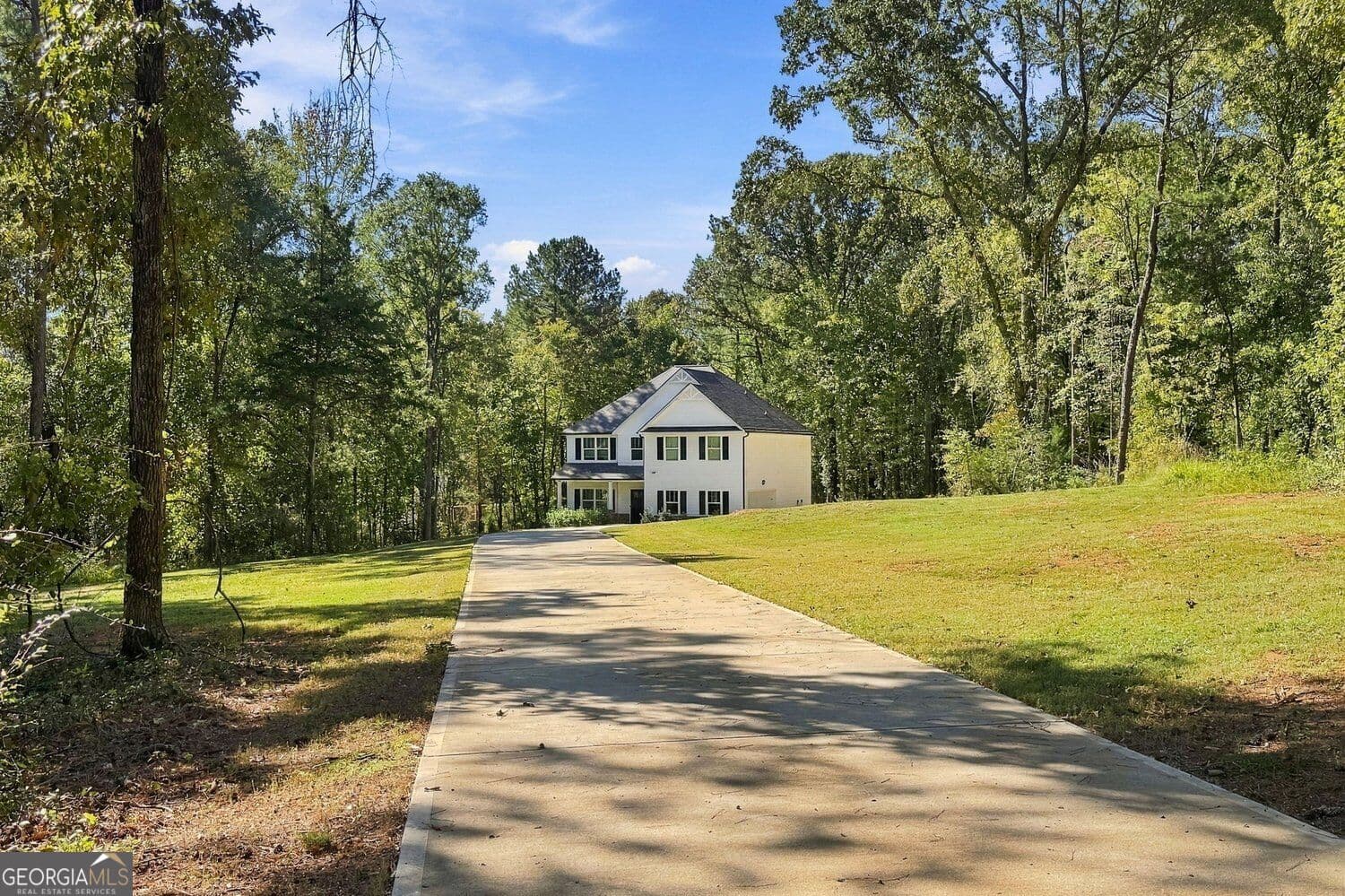 5 bedroom, 3 bathroom, 2,700 sq ft single family residence for sale at 1604 English Road, Forsyth, GA 31029 — photo 4