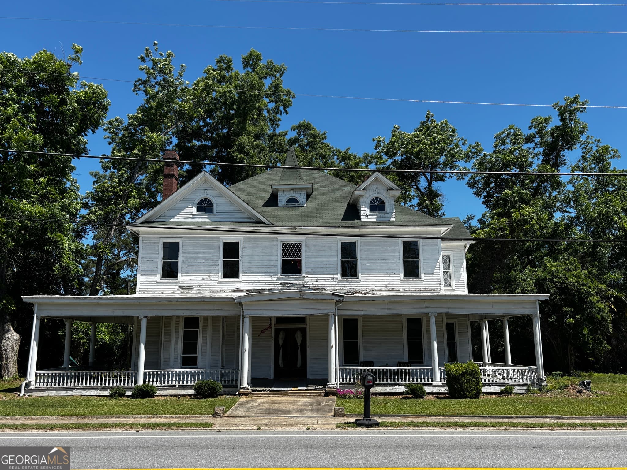 5 bedroom, 2 bathroom, 4,184 sq ft single family residence for sale at 316 Main Street, Warrenton, GA 30828 — photo 3