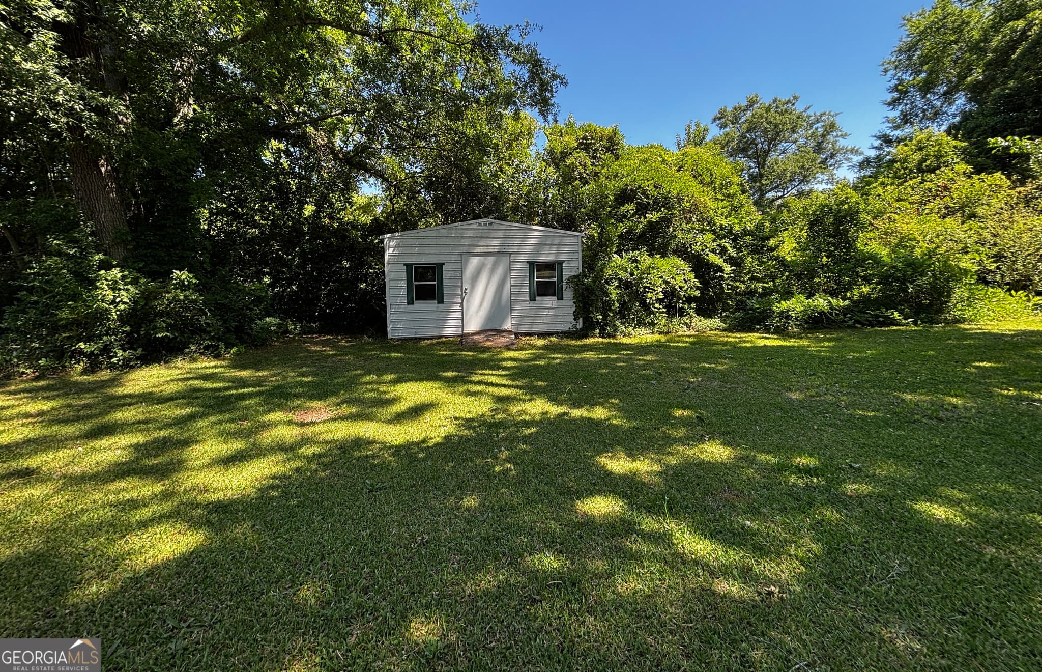 5 bedroom, 2 bathroom, 4,184 sq ft single family residence for sale at 316 Main Street, Warrenton, GA 30828 — photo 9