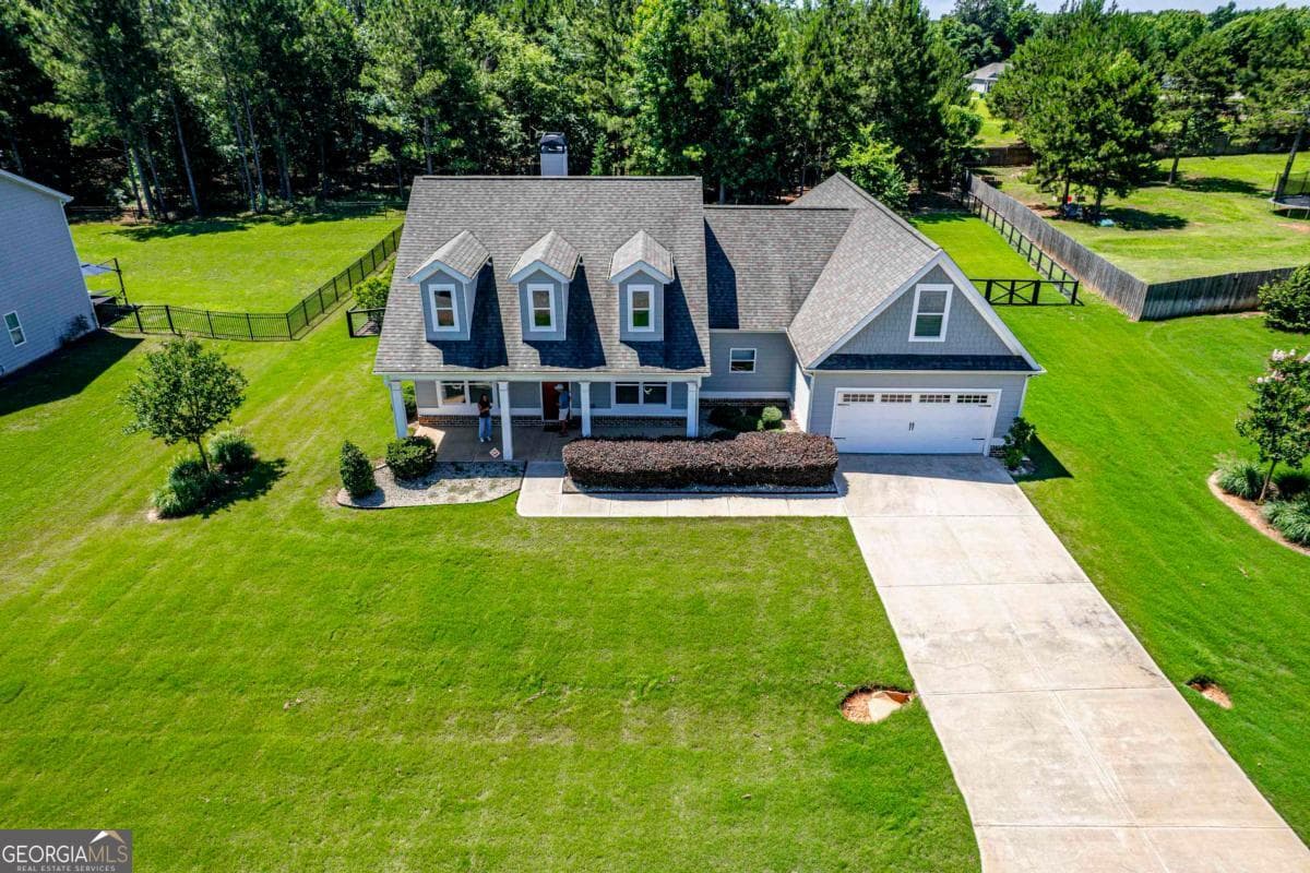 4 bedroom, 2 bathroom, 2,188 sq ft single family residence for sale at 166 Alexander Lakes Drive, Eatonton, GA 31024 — photo 2
