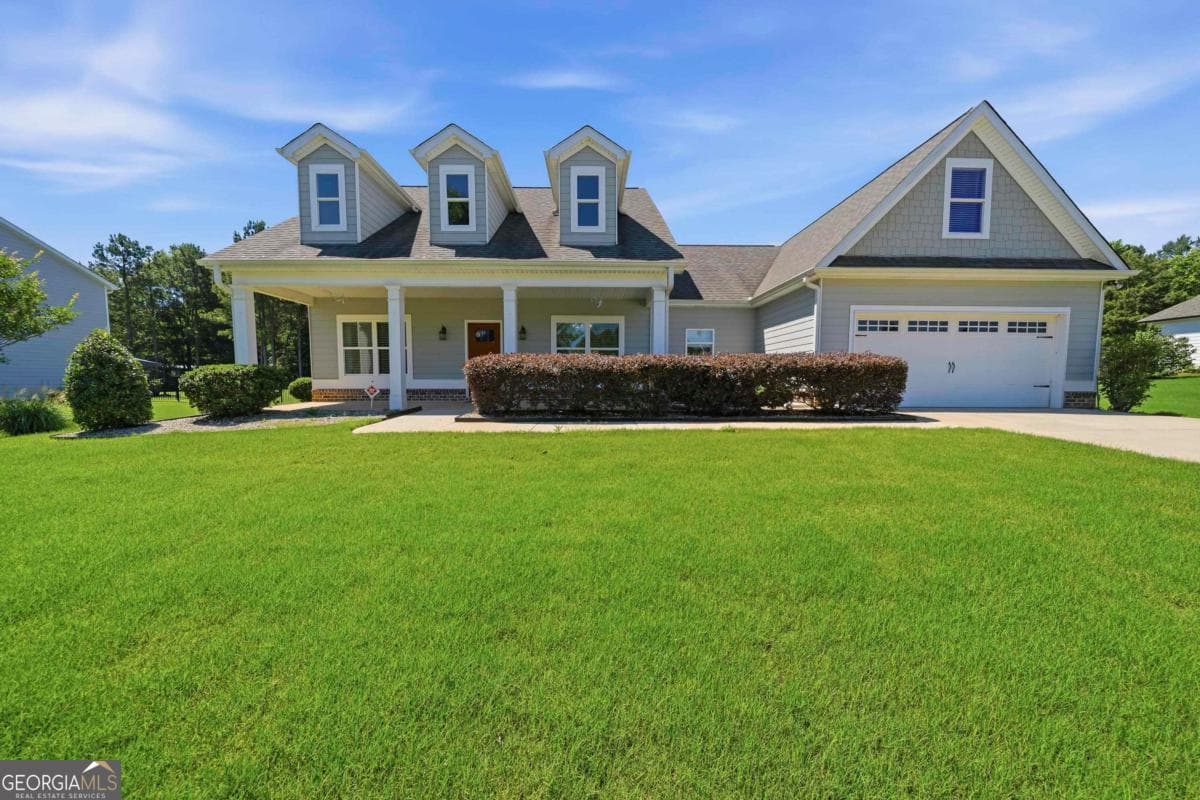 4 bedroom, 2 bathroom, 2,188 sq ft single family residence for sale at 166 Alexander Lakes Drive, Eatonton, GA 31024 — photo 1 of 35