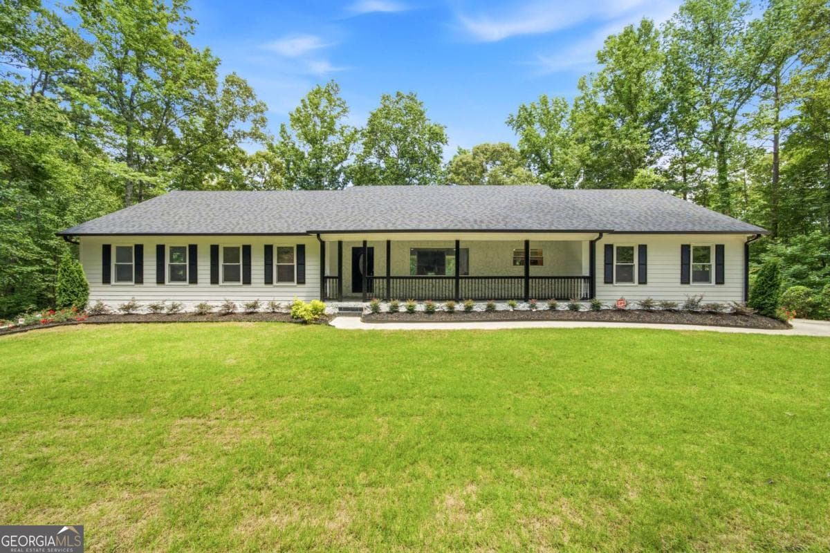 4 bedroom, 3 bathroom, 3,674 sq ft single family residence for sale at 5070 River Lake Drive, Chattahoochee Hills, GA 30213 — photo 2