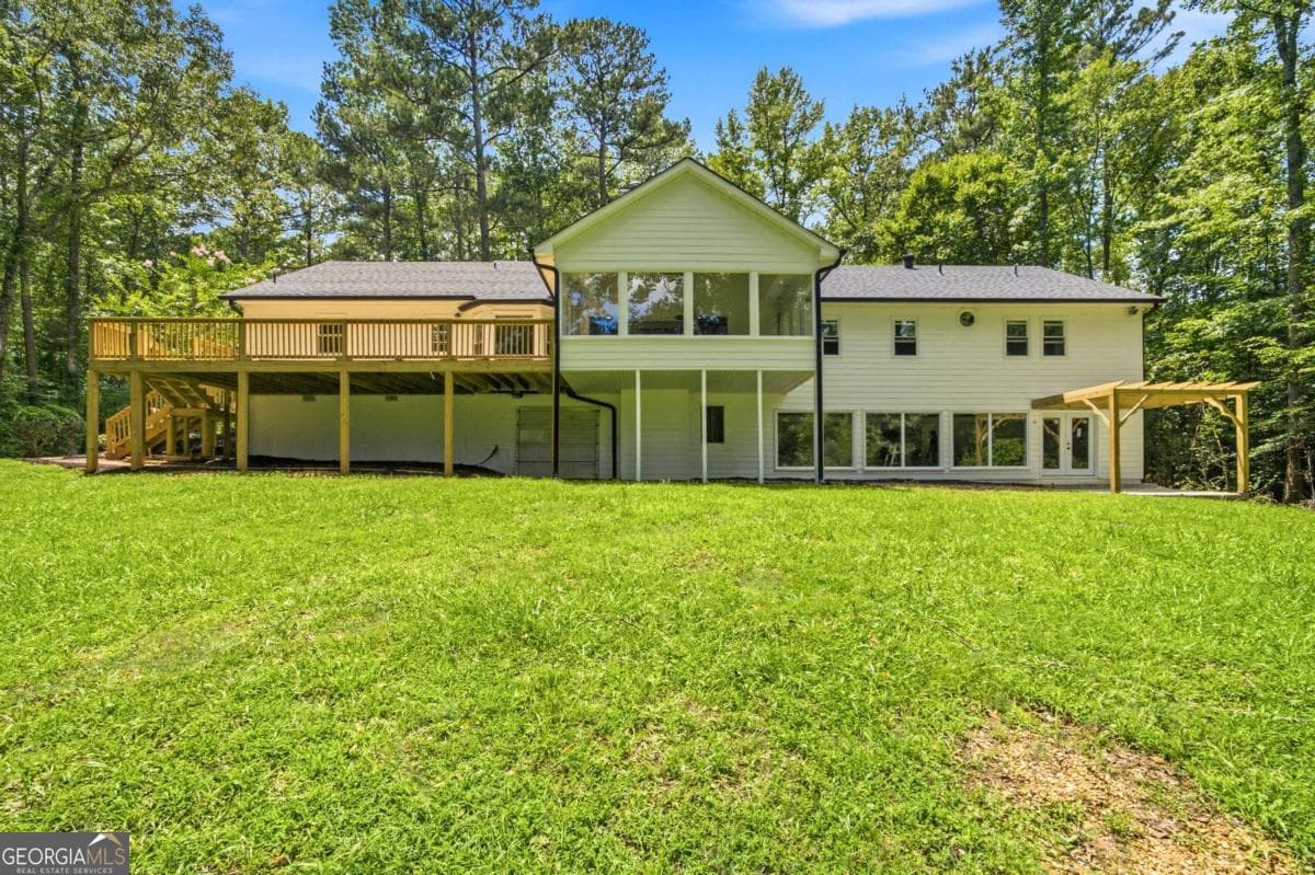 4 bedroom, 3 bathroom, 3,674 sq ft single family residence for sale at 5070 River Lake Drive, Chattahoochee Hills, GA 30213 — photo 4