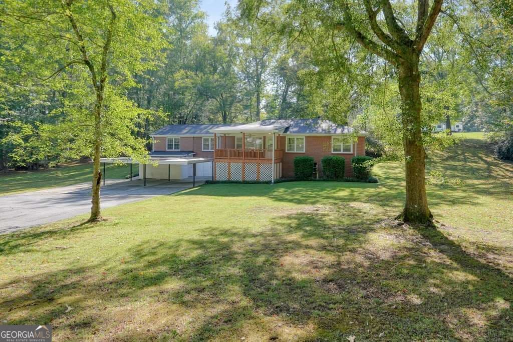 4 bedroom, 2 bathroom, 1,685 sq ft single family residence for sale at 7146 Old Beulah Road, Lithia Springs, GA 30122 — photo 3