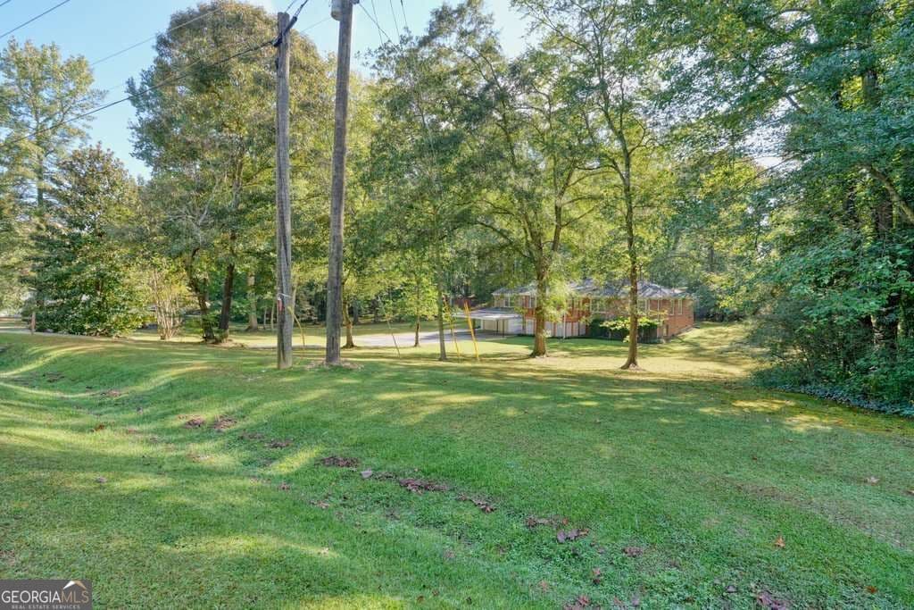 4 bedroom, 2 bathroom, 1,685 sq ft single family residence for sale at 7146 Old Beulah Road, Lithia Springs, GA 30122 — photo 5