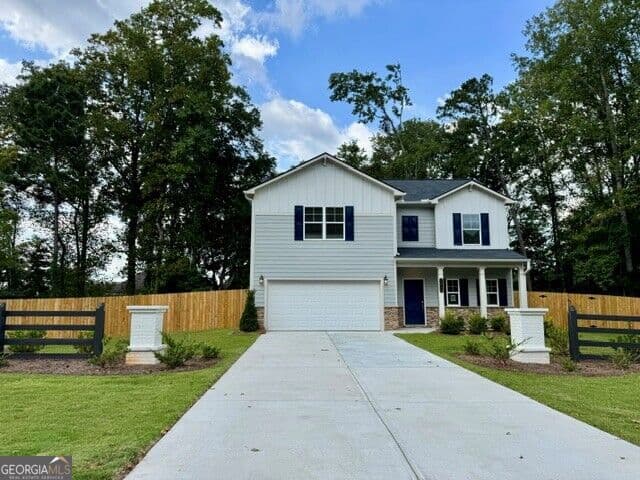 4 bedroom, 2.5 bathroom single family residence for sale at 4690 Glore Road, Mableton, GA 30126 — photo 2