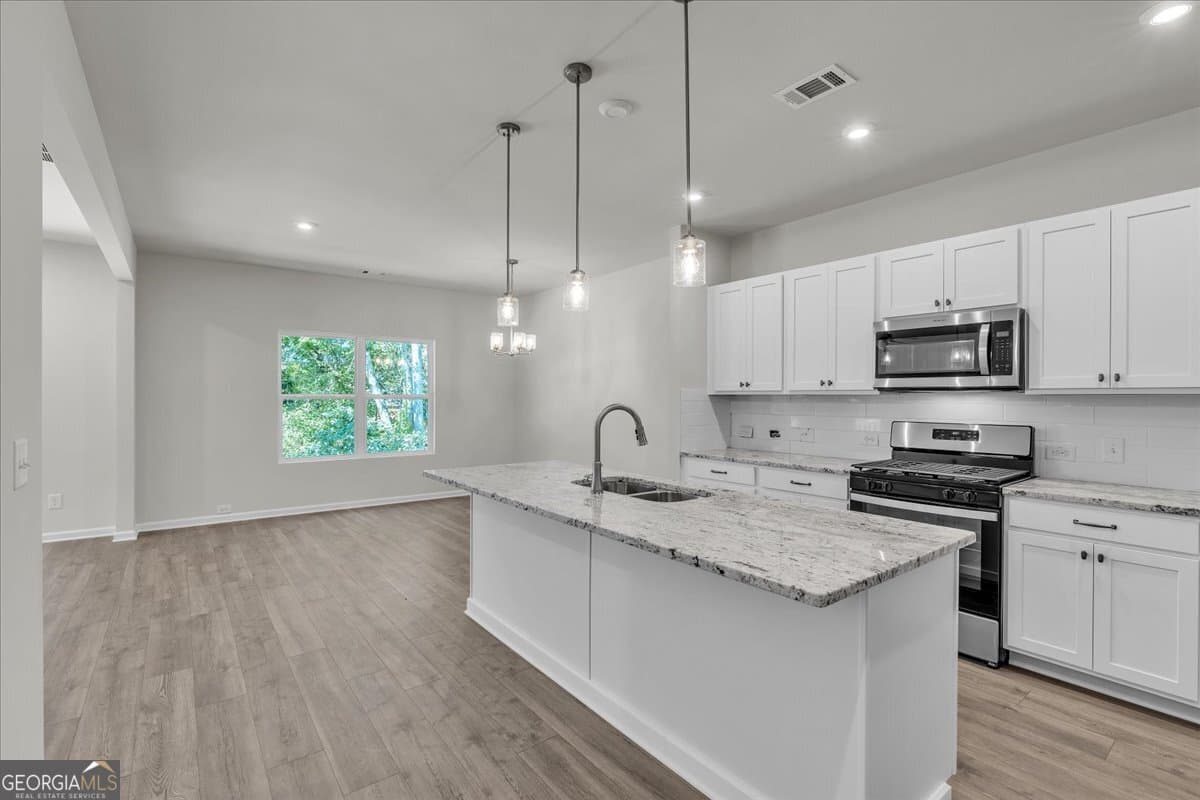 4 bedroom, 2.5 bathroom single family residence for sale at 4690 Glore Road, Mableton, GA 30126 — photo 9