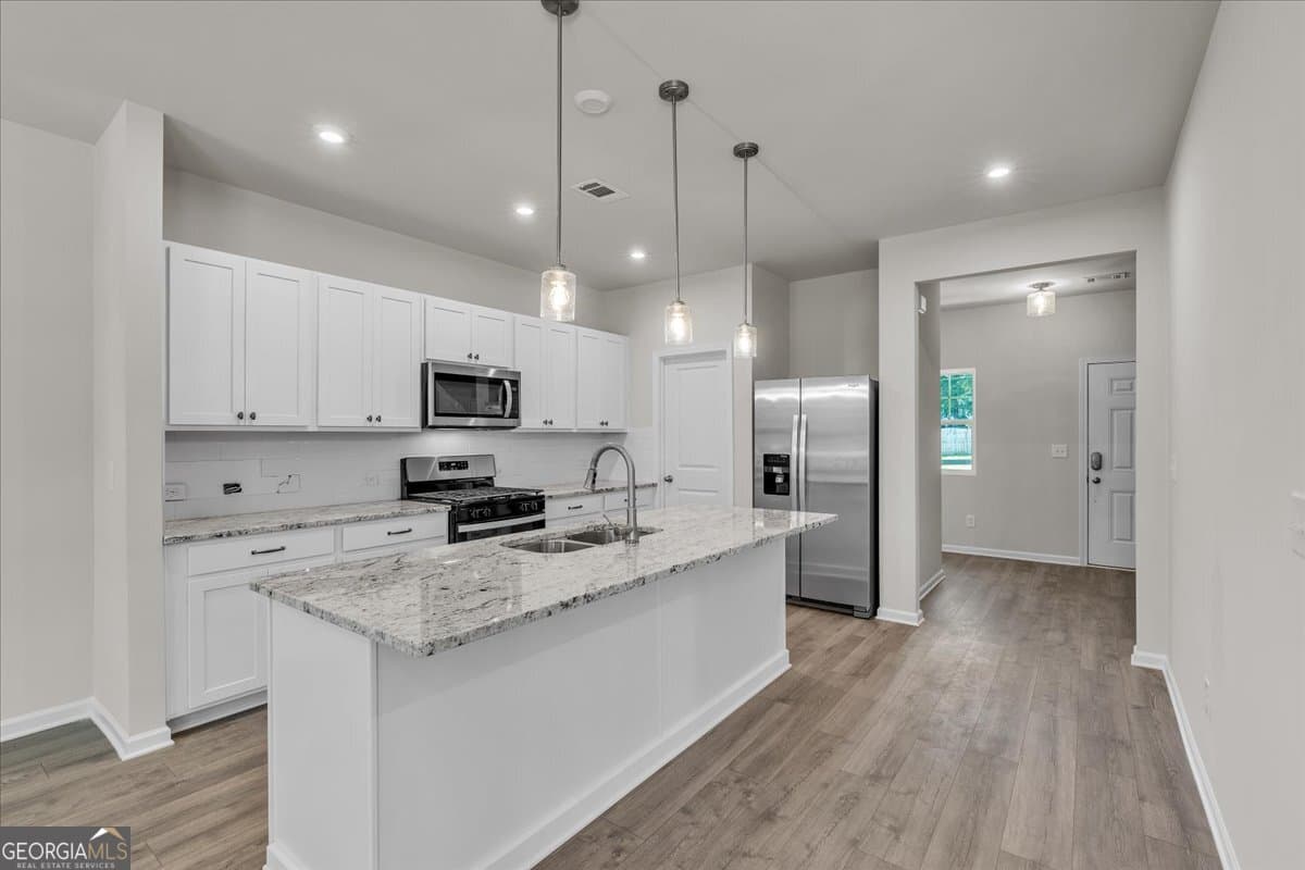 4 bedroom, 2.5 bathroom single family residence for sale at 4690 Glore Road, Mableton, GA 30126 — photo 10