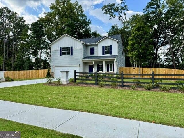 4 bedroom, 2.5 bathroom single family residence for sale at 4690 Glore Road, Mableton, GA 30126 — photo 4