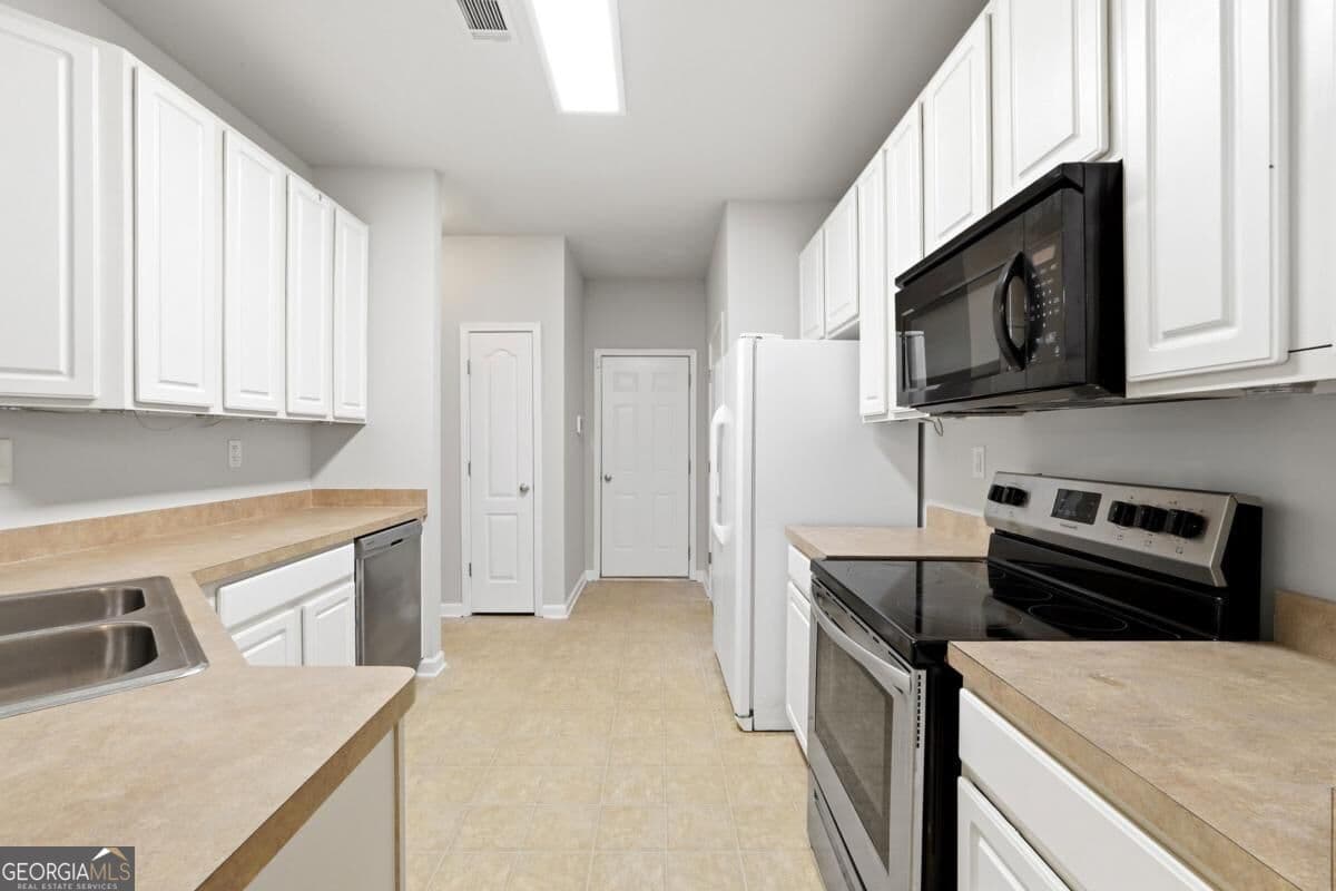 3 bedroom, 2.5 bathroom, 1,875 sq ft townhouse for sale at 1006 Ivydale Circle, Lawrenceville, GA 30045 — photo 5