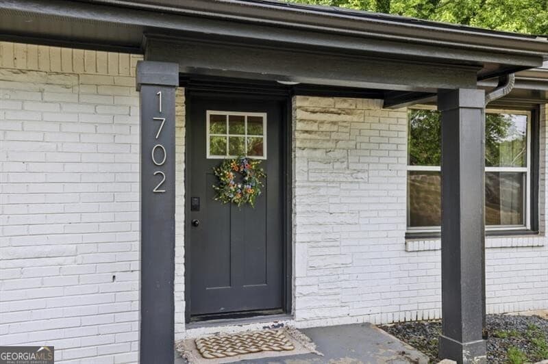 4 bedroom, 2.5 bathroom, 1,711 sq ft single family residence sold at 1702 Valencia Road, Decatur, GA 30032