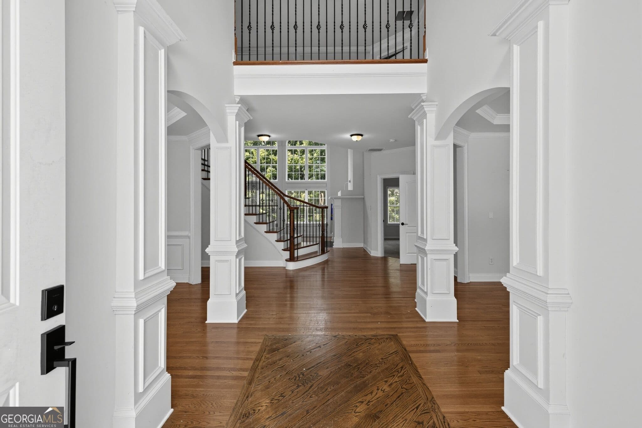 6 bedroom, 5 bathroom, 5,148 sq ft single family residence for sale at 2577 Ozella Place, South Fulton, GA 30331 — photo 2