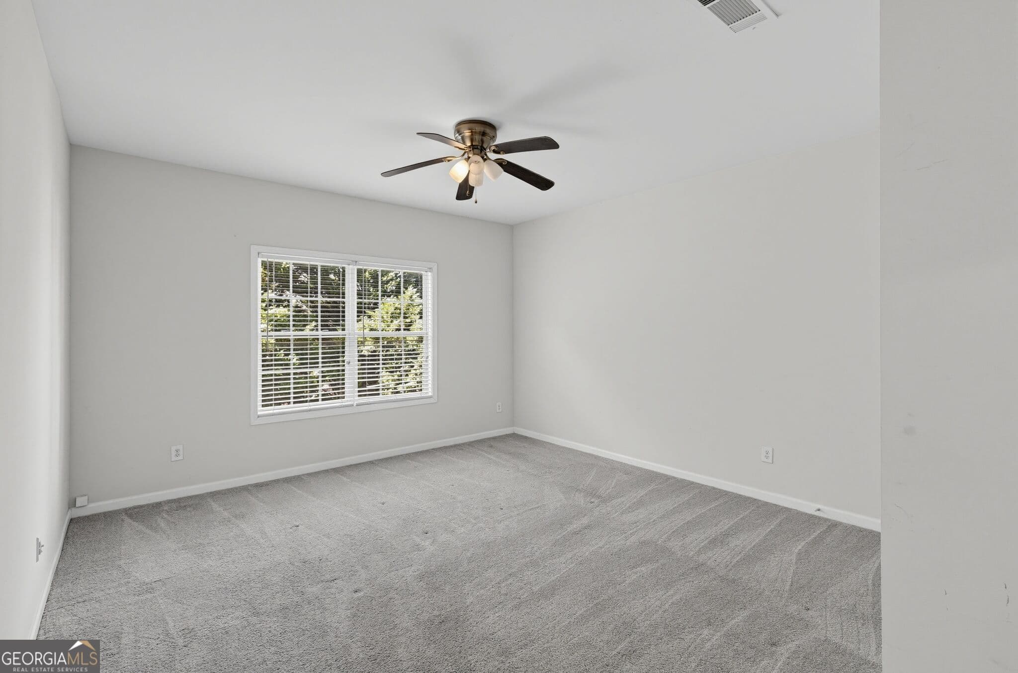 6 bedroom, 5 bathroom, 5,148 sq ft single family residence for sale at 2577 Ozella Place, South Fulton, GA 30331 — photo 9
