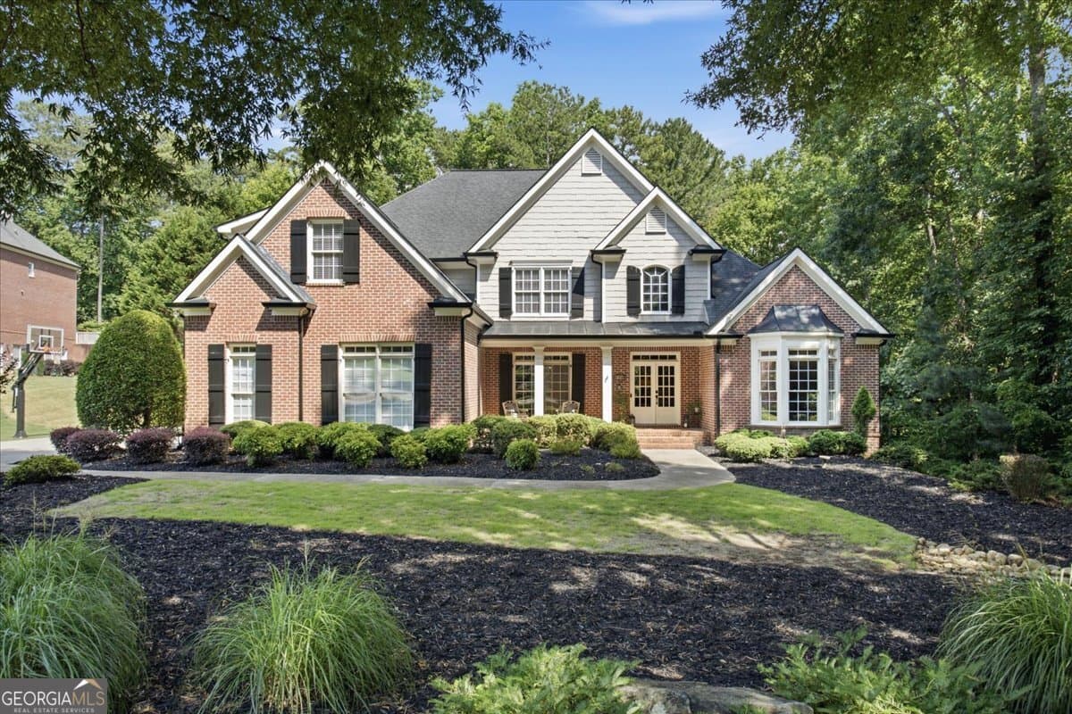 6 bedroom, 4.5 bathroom, 6,576 sq ft single family residence sold at 880 Colonial Lane, Milton, GA 30004
