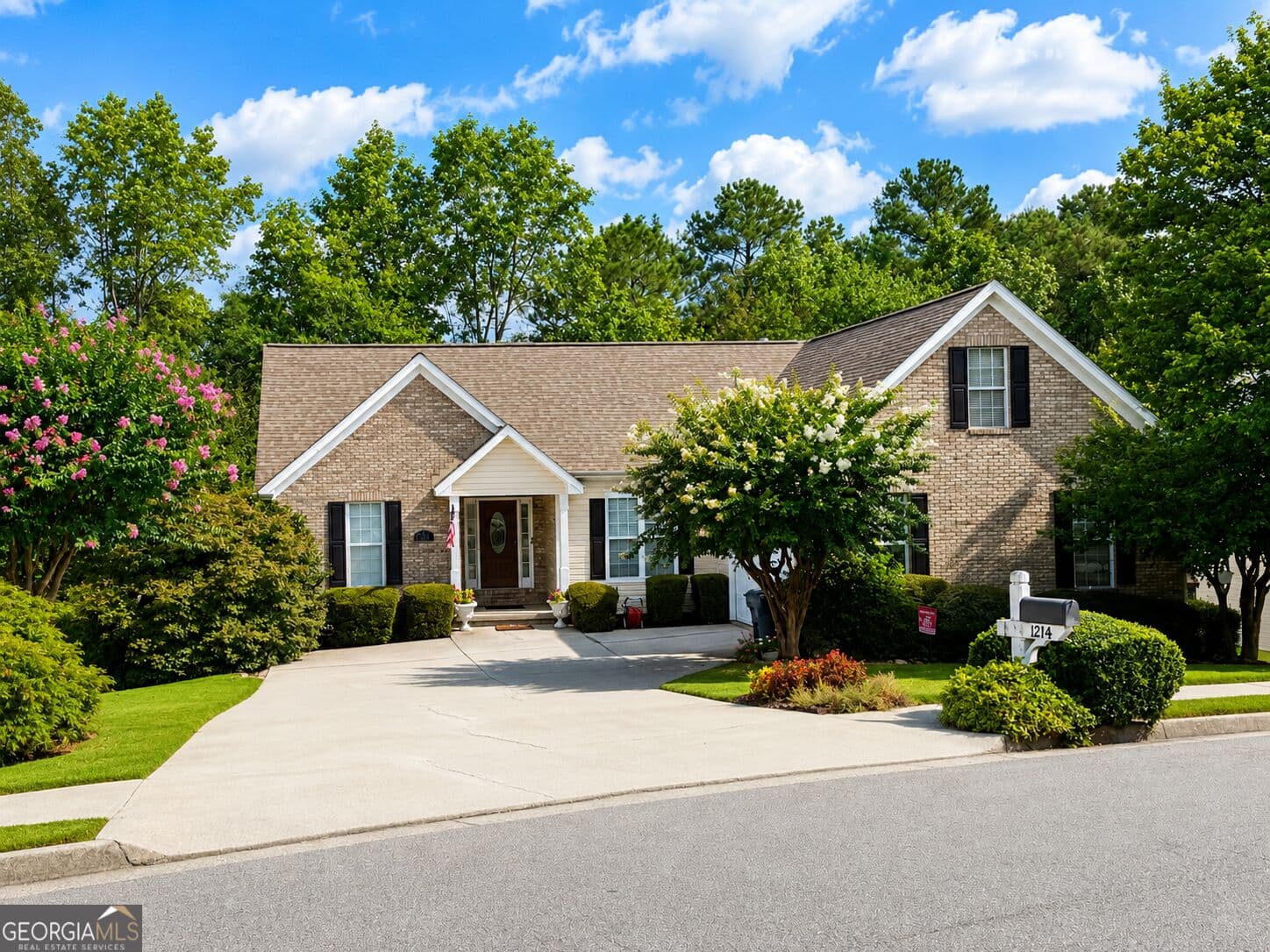 6 bedroom, 3 bathroom single family residence for sale at 1214 Bramlett Oak Court, Lawrenceville, GA 30045 — photo 1 of 24