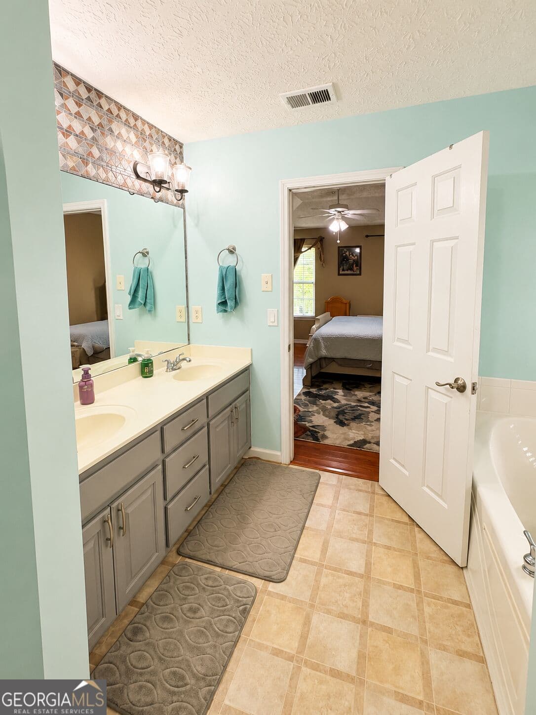 6 bedroom, 3 bathroom single family residence for sale at 1214 Bramlett Oak Court, Lawrenceville, GA 30045 — photo 10