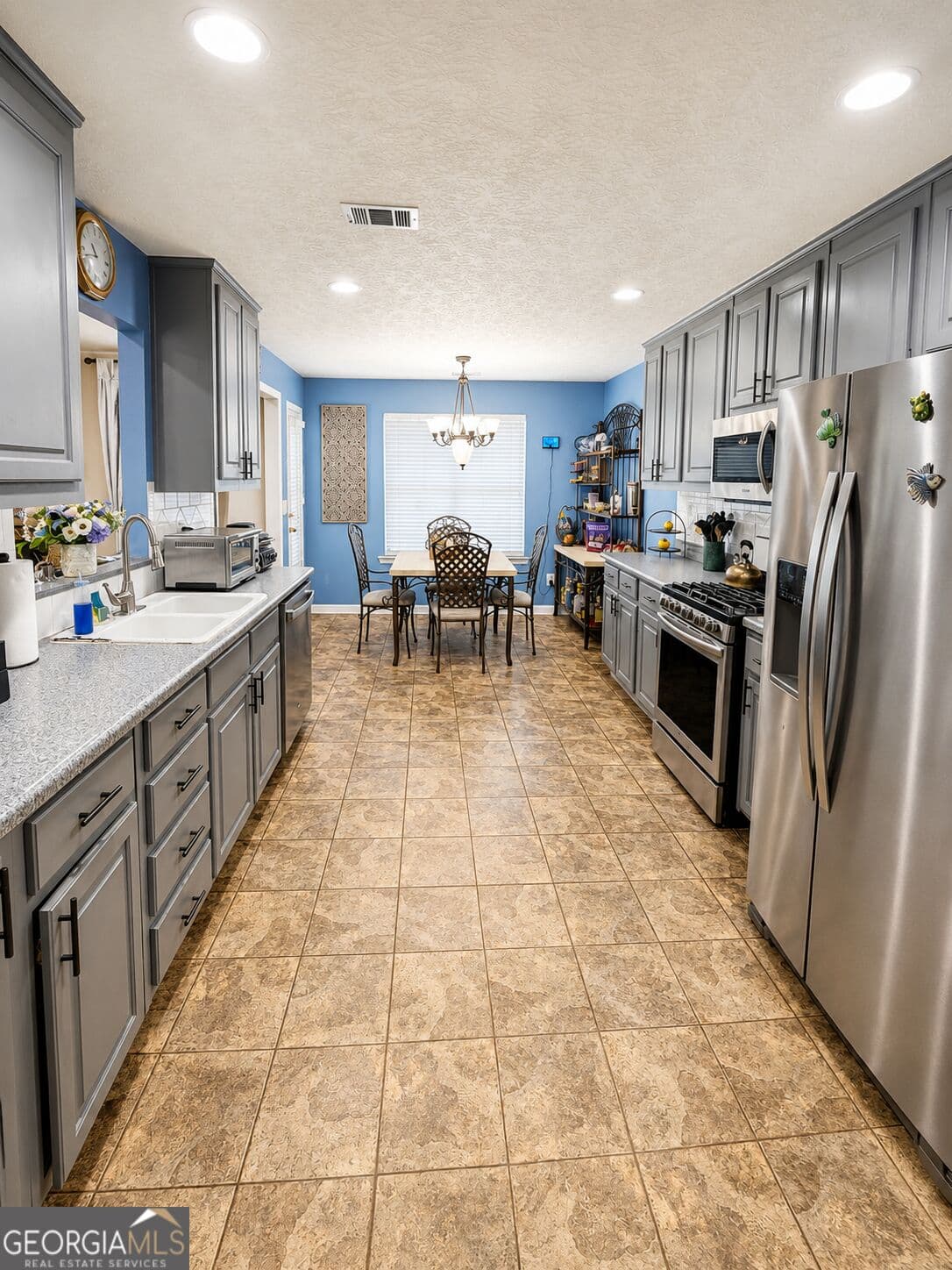 6 bedroom, 3 bathroom single family residence for sale at 1214 Bramlett Oak Court, Lawrenceville, GA 30045 — photo 8