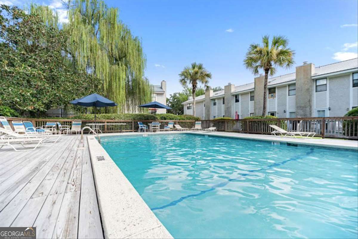 2 bedroom, 1.5 bathroom, 1,072 sq ft townhouse for sale at 1000 Sea Island Road 28, St. Simons, GA 31522 — photo 1 of 58