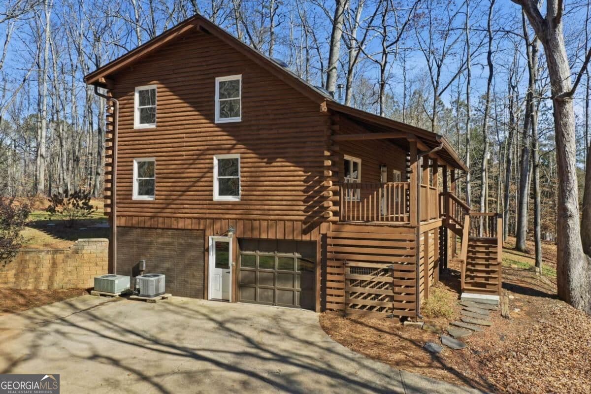 3 bedroom, 2 bathroom, 1,820 sq ft cabin,single family residence for sale at 437 Twin Lakes Drive, Canton, GA 30115 — photo 4