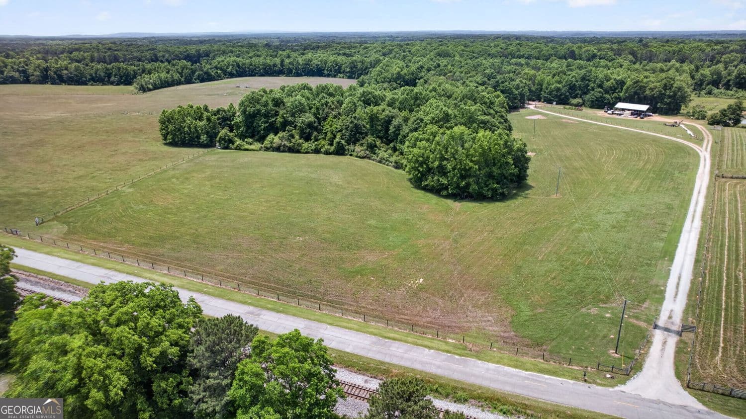 3 bedroom, 2 bathroom, 1,664 sq ft single family residence for sale at 454 Tom Bell Road, Milner, GA 30257 — photo 4
