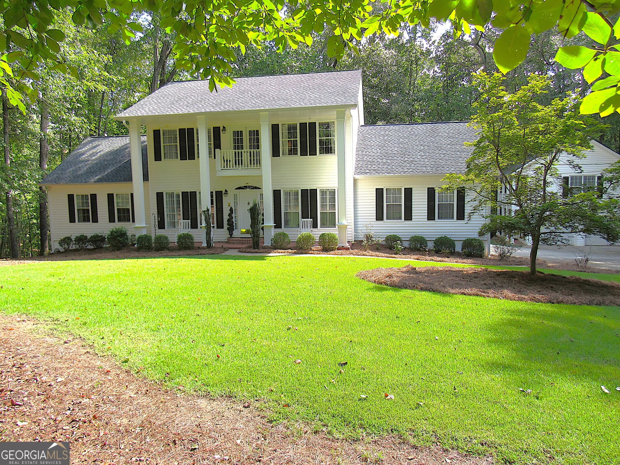 4 bedroom, 3.5 bathroom, 2,332 sq ft single family residence for sale at 6009 Big A Road, Douglasville, GA 30135 — photo 2
