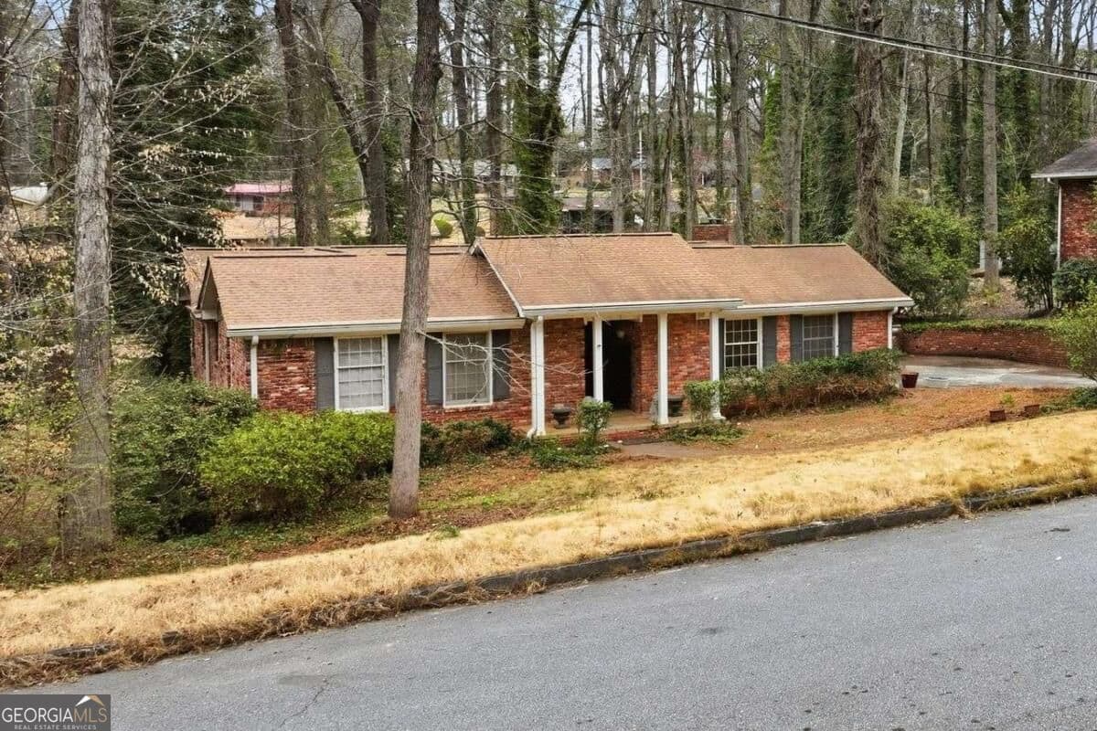 5 bedroom, 3 bathroom, 3,452 sq ft single family residence for sale at 2897 Branchwood Drive, Atlanta, GA 30344 — photo 1 of 36