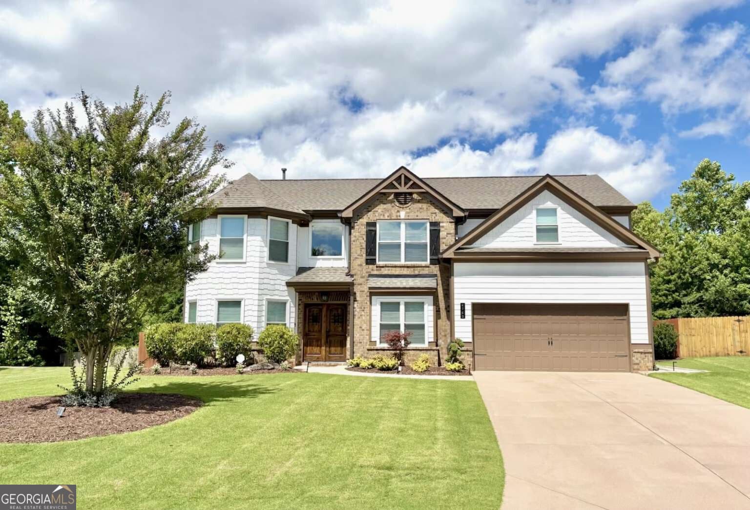 5 bedroom, 3 bathroom, 2,841 sq ft single family residence sold at 4740 Orchard Park Lane, Cumming, GA 30028