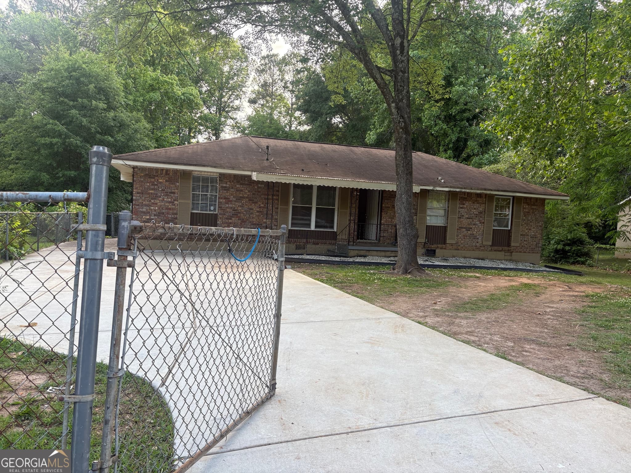 4 bedroom, 2 bathroom, 1,590 sq ft single family residence for sale at 8145 Attleboro Drive, Jonesboro, GA 30238 — photo 1 of 18