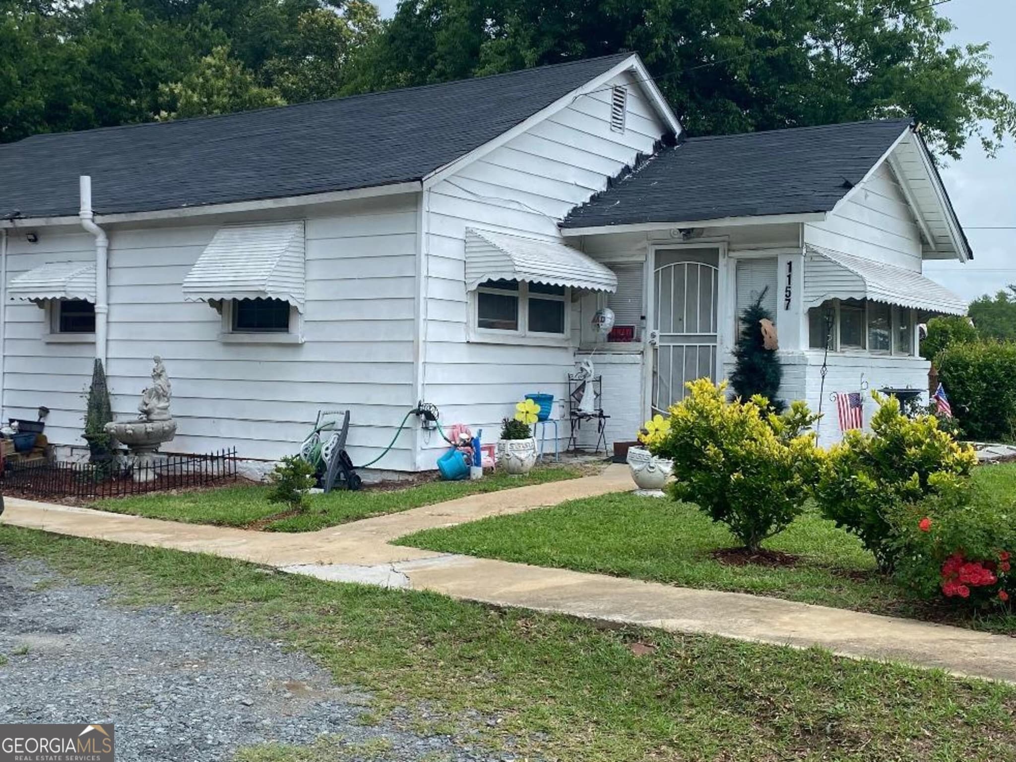 4 bedroom, 3 bathroom, 1,106 sq ft single family residence for sale at 1157 Rocky Creek Road, Macon, GA 31206